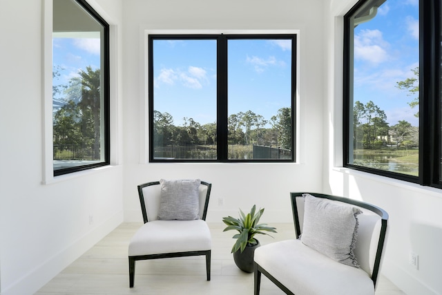 living area featuring plenty of natural light