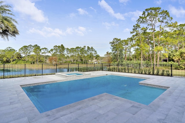 view of swimming pool featuring a patio, a water view, and an in ground hot tub