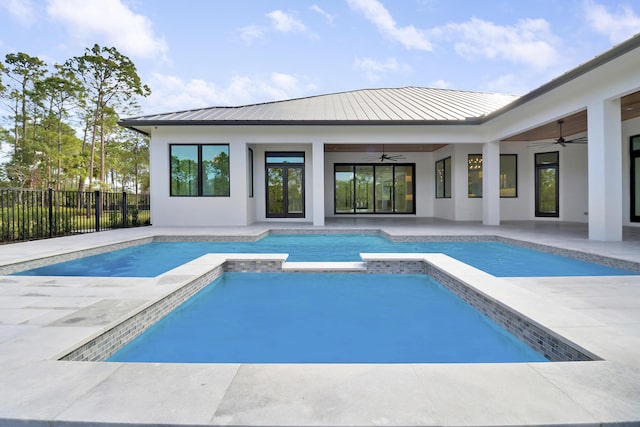 view of swimming pool featuring an in ground hot tub, ceiling fan, and a patio area