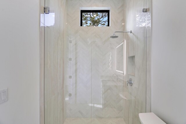 bathroom featuring walk in shower