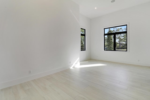 empty room with light wood-type flooring