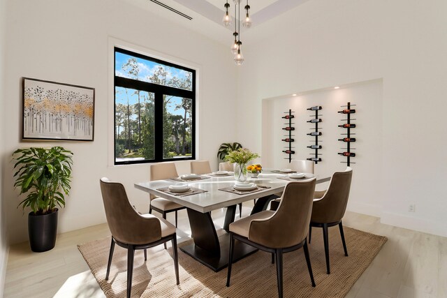 dining space with light wood-type flooring