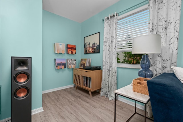 sitting room with light hardwood / wood-style flooring