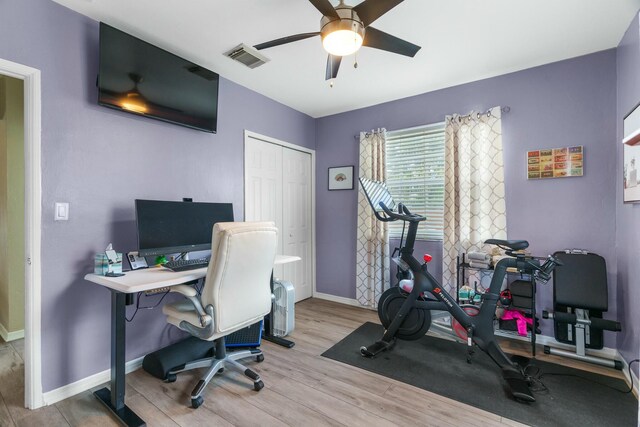 office featuring ceiling fan and light hardwood / wood-style floors