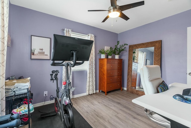 interior space with ceiling fan and light wood-type flooring