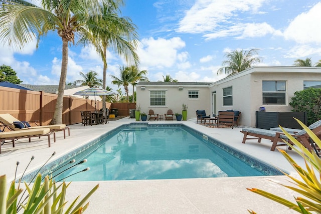 view of pool featuring a patio