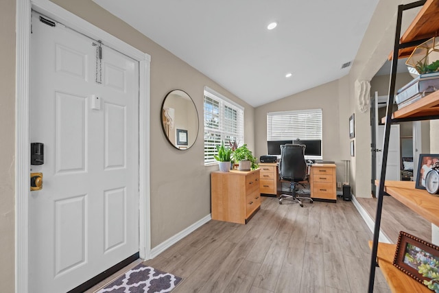 office featuring light hardwood / wood-style flooring and lofted ceiling