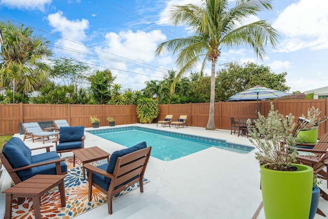 view of pool featuring a patio area