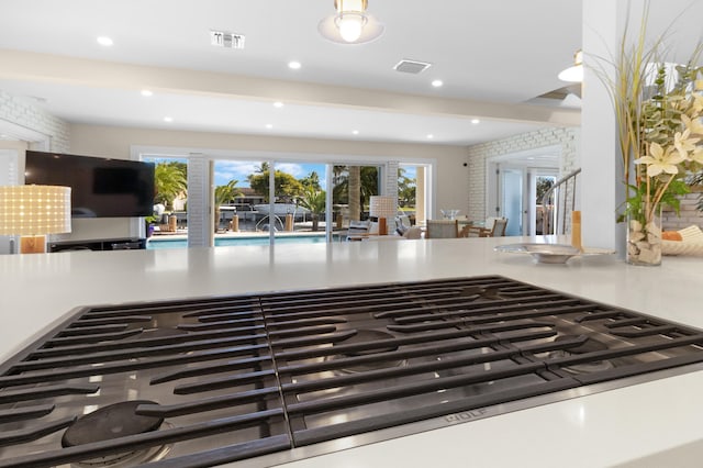 interior details featuring stainless steel gas cooktop