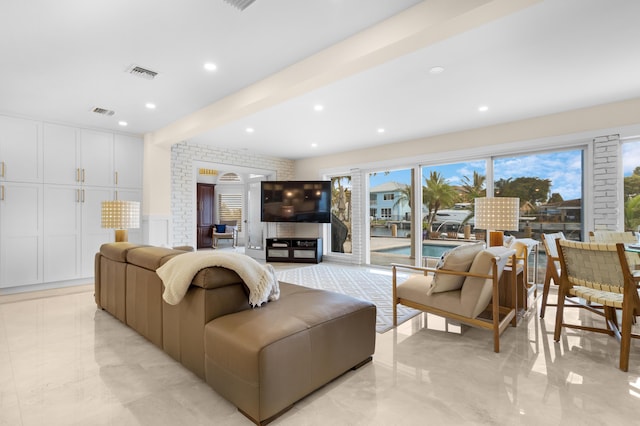 living room with beamed ceiling