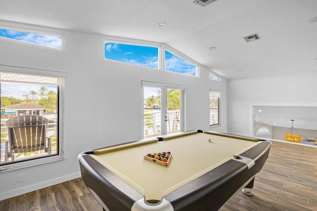 recreation room with french doors, dark hardwood / wood-style floors, vaulted ceiling, and billiards