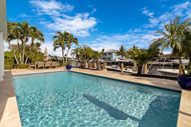 view of swimming pool with a patio area