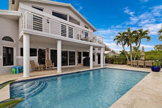 view of pool with a patio area