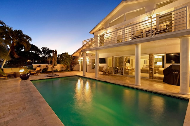 view of pool featuring a patio area