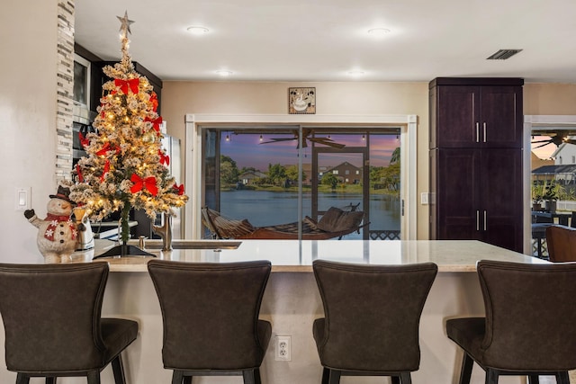 dining space featuring ceiling fan