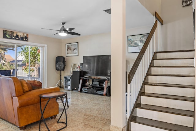 living room with ceiling fan