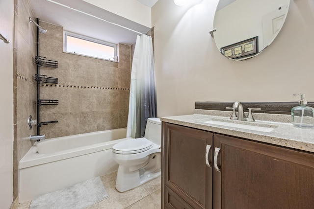 full bathroom featuring tile patterned floors, shower / bath combination with curtain, toilet, and vanity