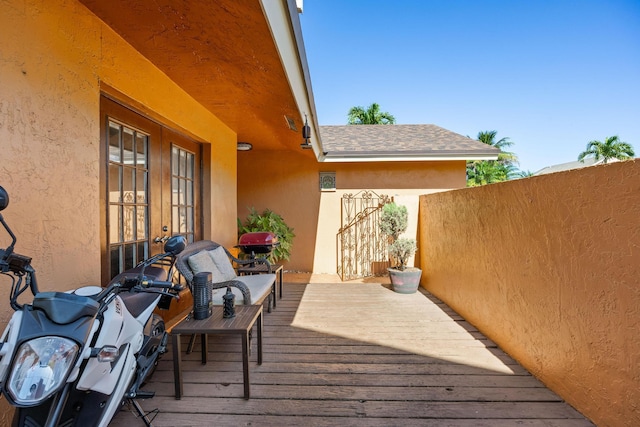 wooden terrace with french doors