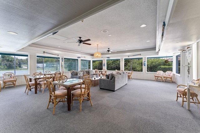 interior space with ceiling fan