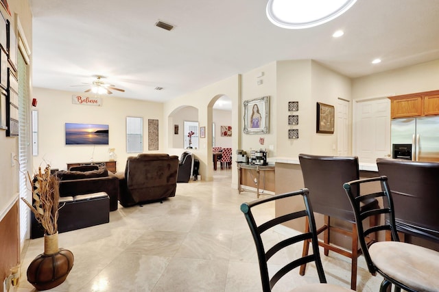 living room with ceiling fan