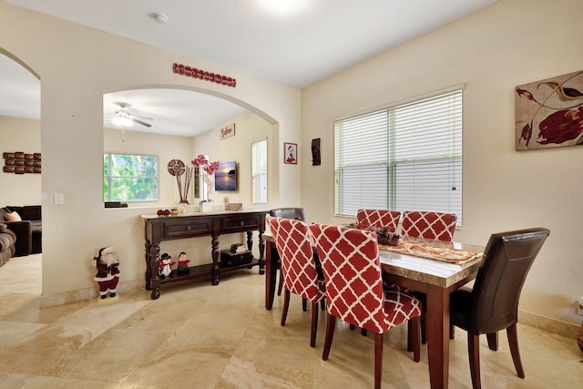 dining area with ceiling fan