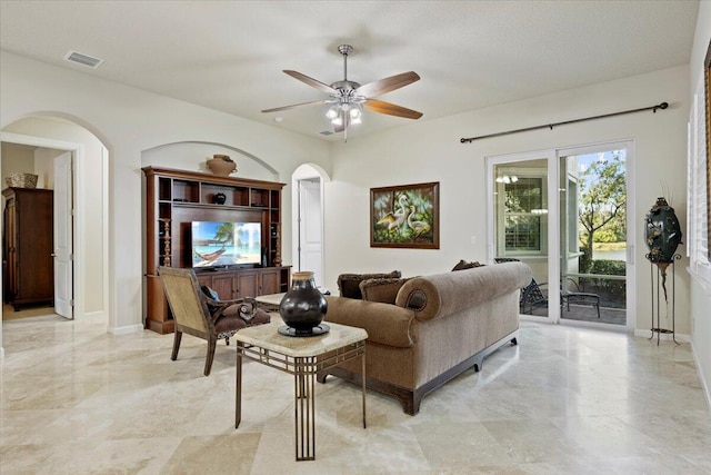 living room featuring ceiling fan