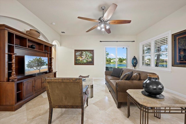 living room with ceiling fan