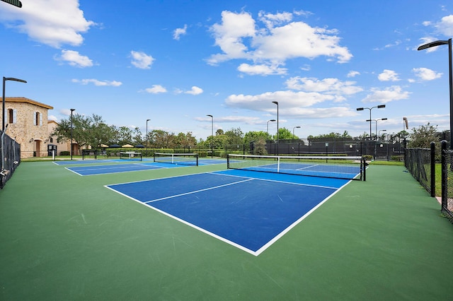 view of tennis court with basketball court