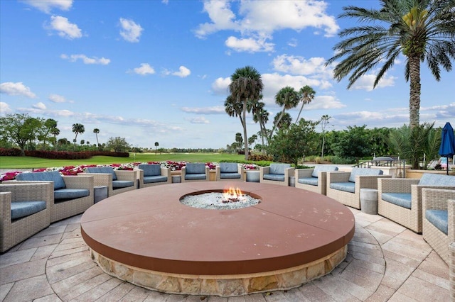 view of patio / terrace featuring a fire pit