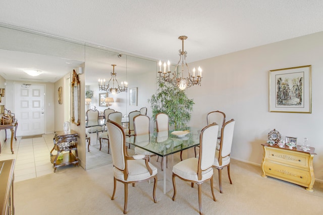 dining room featuring carpet floors, a chandelier, and a textured ceiling