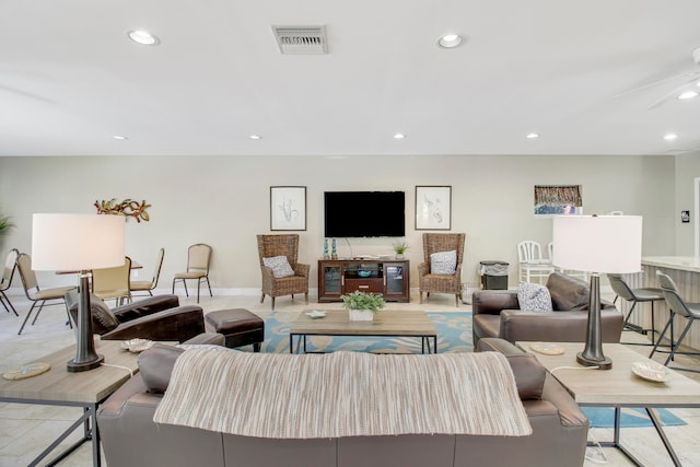 living room featuring ceiling fan