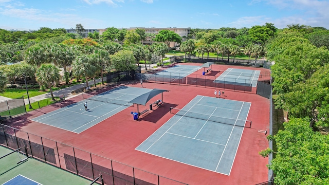 view of sport court with basketball hoop