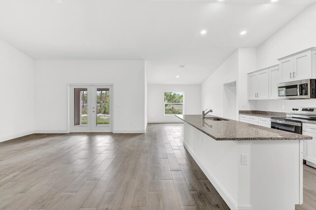 unfurnished room featuring vaulted ceiling and dark hardwood / wood-style floors