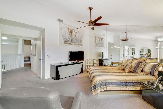 carpeted bedroom featuring ceiling fan and lofted ceiling