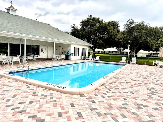 view of pool with a patio