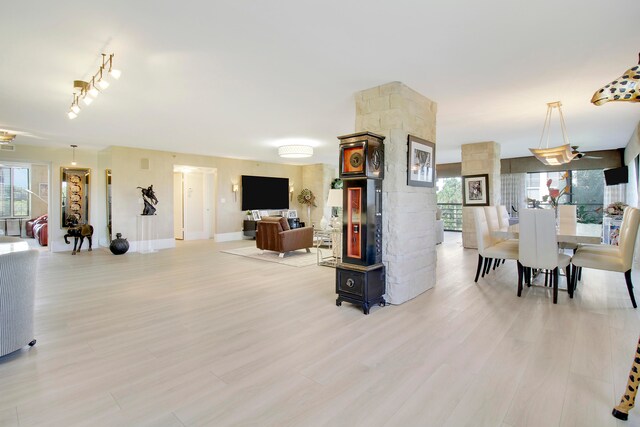 living room with light hardwood / wood-style flooring