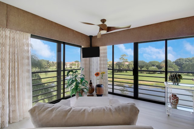 bedroom featuring light wood-type flooring and ceiling fan