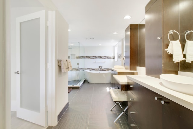 bathroom featuring a bathing tub and vanity