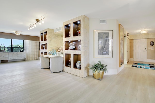 kitchen with light hardwood / wood-style flooring