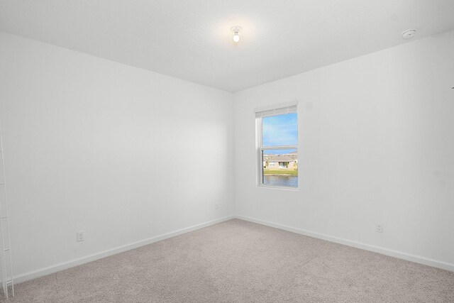 empty room featuring carpet floors