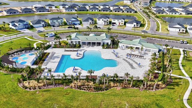 bird's eye view with a water view