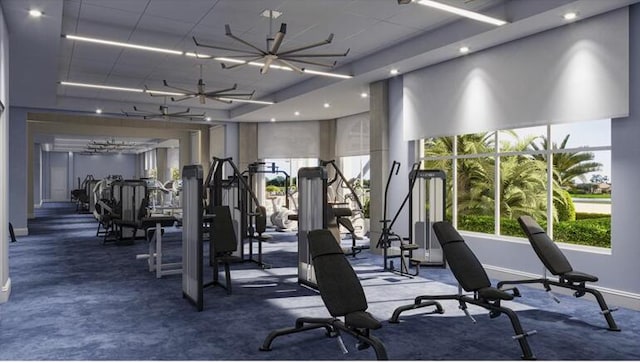 workout area featuring ceiling fan with notable chandelier