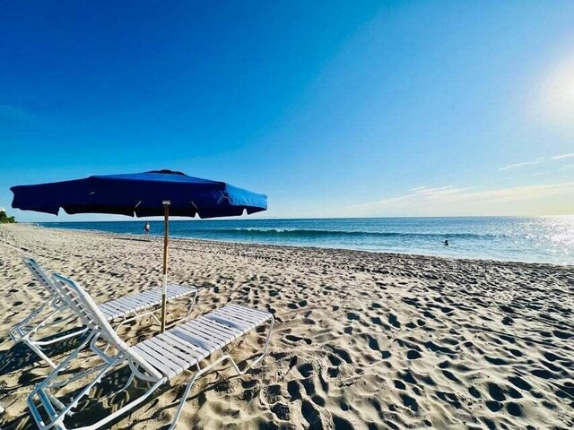 property view of water with a beach view