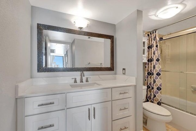 full bathroom featuring vanity, toilet, and shower / tub combo