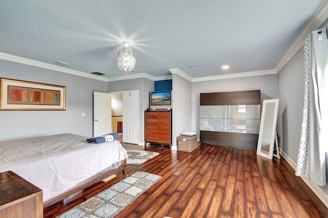 unfurnished bedroom with ornamental molding and dark wood-type flooring