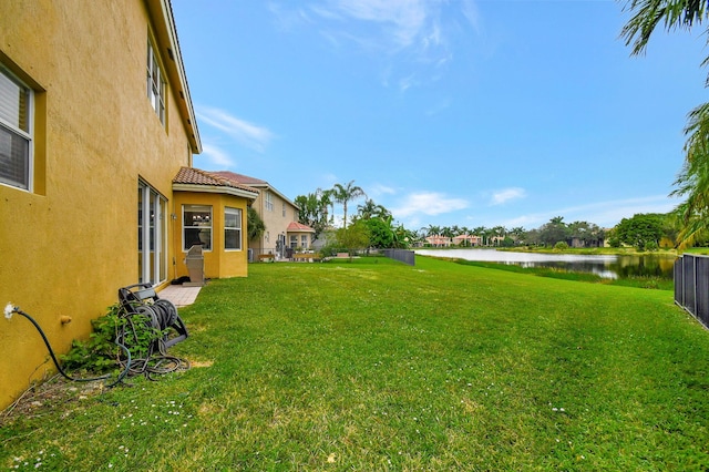 view of yard featuring a water view