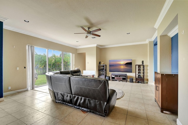 living room with a textured ceiling, crown molding, ceiling fan, and light tile patterned floors