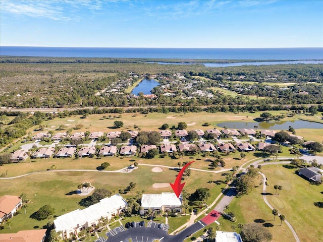 bird's eye view with a water view