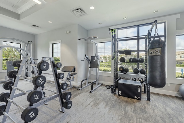 exercise room featuring recessed lighting, visible vents, and baseboards