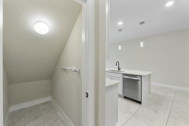 interior space featuring tile patterned floors and sink